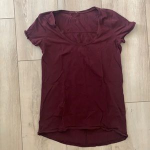 Lululemon short sleeve Tee with overlock Stitch detail at center back size S